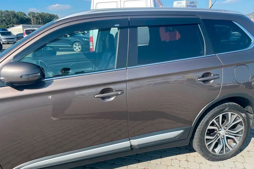 Дефлектори вікон (вітровики) Mitsubishi Pajero Sport 2015 - рр (HIC) 4 шт M60-IJ фото