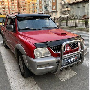 Дефлектор капота Для Mitsubishi L200 1996-2006 рр 30570496-010409-30010101 фото